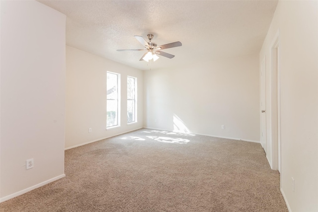 5037 Collingwood Dr, Garland, TX 75043 - empty room featuring baseboards, carpet flooring, a textured ceiling, and a ceiling fan