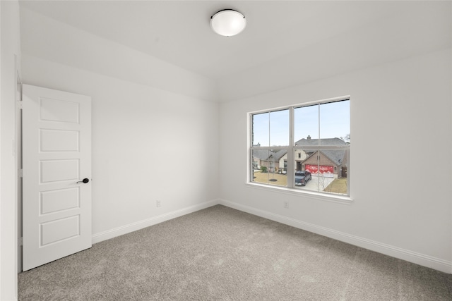 unfurnished room featuring carpet flooring