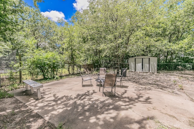 view of patio with a shed