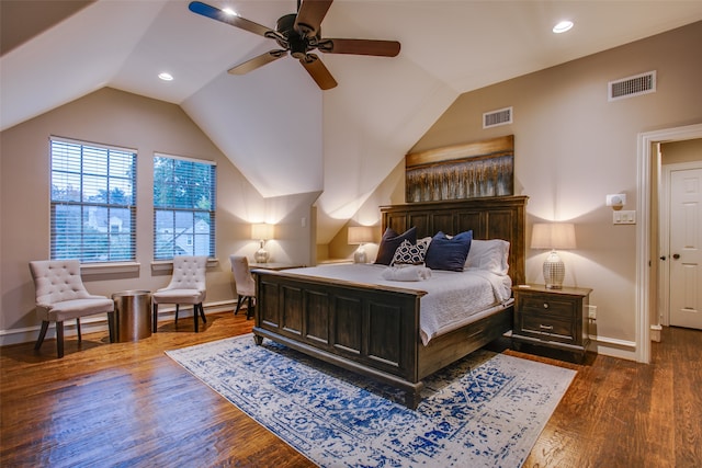 bedroom featuring lofted ceiling, dark wood-type flooring, and ceiling fan