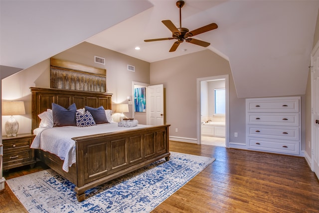 bedroom featuring lofted ceiling, ensuite bath, ceiling fan, and dark hardwood / wood-style flooring