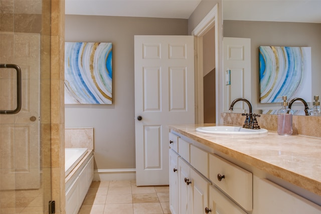 bathroom featuring vanity, independent shower and bath, and tile patterned flooring