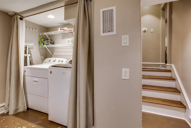 laundry area featuring independent washer and dryer