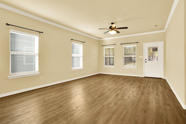 unfurnished room with crown molding, hardwood / wood-style flooring, and ceiling fan