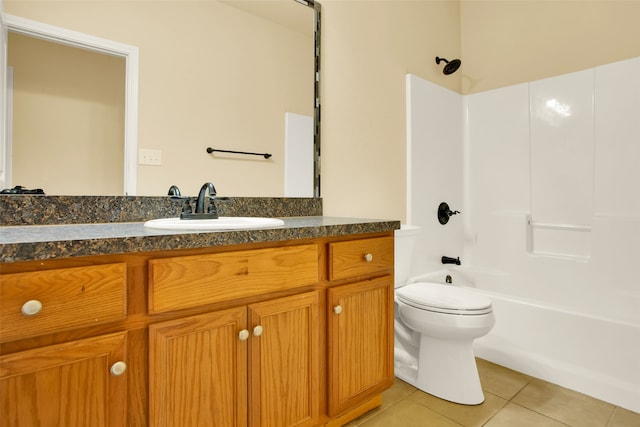 full bathroom with vanity, tile patterned floors, toilet, and shower / bathtub combination