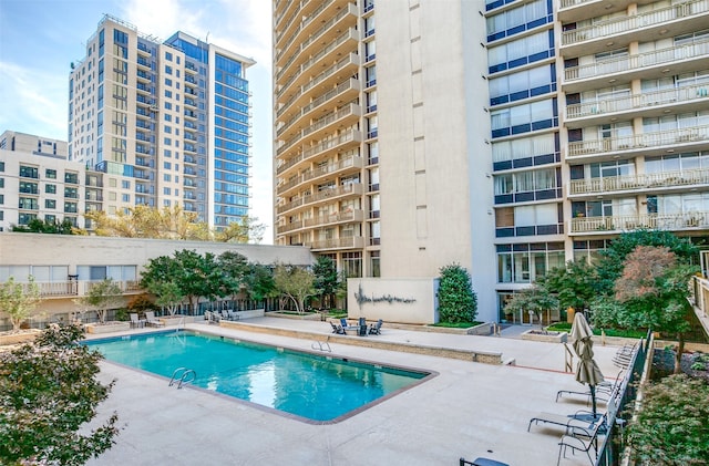 view of pool with a patio area