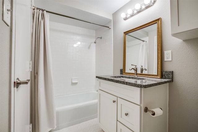 bathroom with vanity and shower / bath combination with curtain