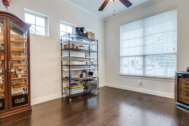 office area featuring ceiling fan, wood finished floors, baseboards, and ornamental molding