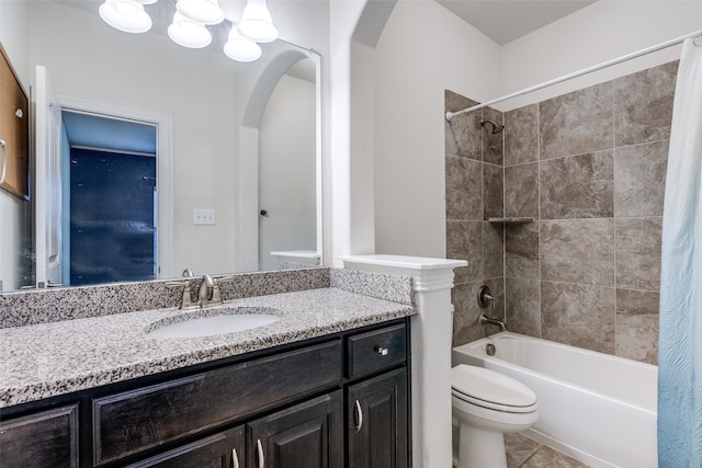 full bathroom featuring vanity, shower / bath combination with curtain, toilet, and tile patterned flooring