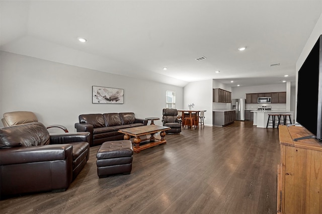 living room featuring dark hardwood / wood-style floors