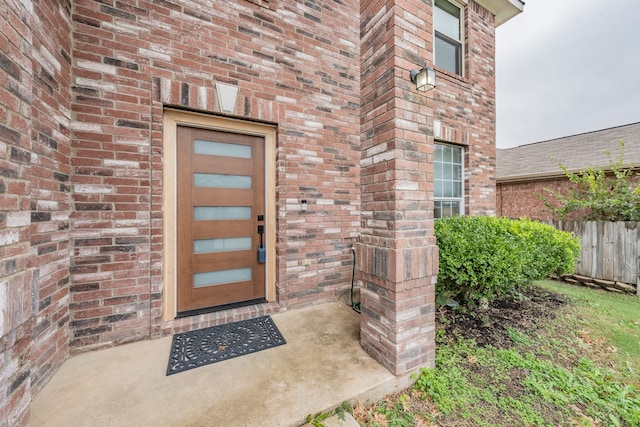 doorway to property featuring a patio area