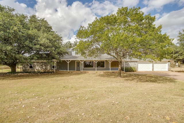 view of front of house featuring covered porch and a garage