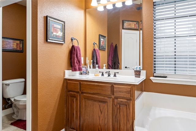 bathroom with vanity, walk in shower, a textured ceiling, and tile patterned flooring