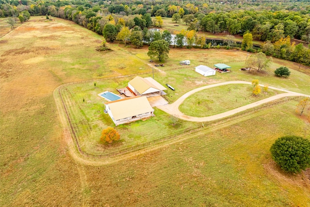 rear view of property featuring a yard