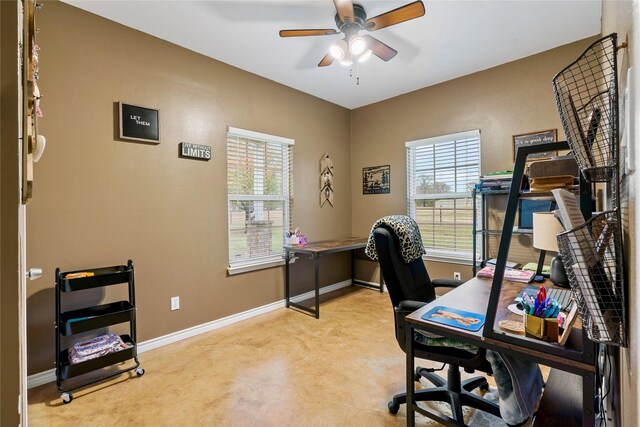 bedroom featuring ceiling fan and concrete flooring