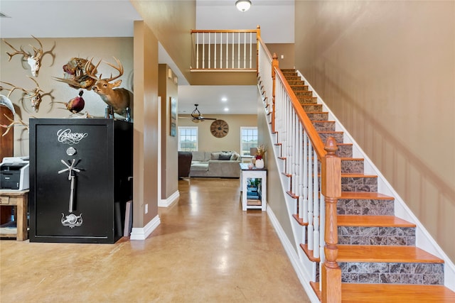 game room with ceiling fan, concrete flooring, and pool table