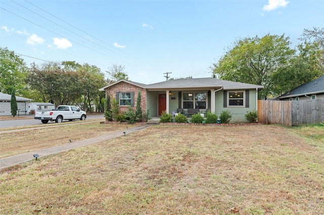 view of front of property with a front lawn and a porch