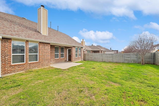 view of yard with a patio area