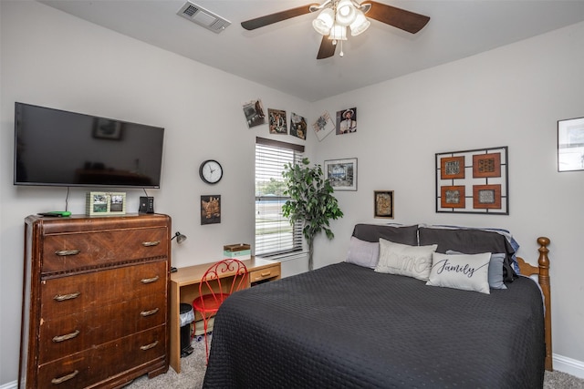 bedroom with ceiling fan and carpet