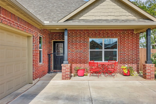 entrance to property featuring a garage