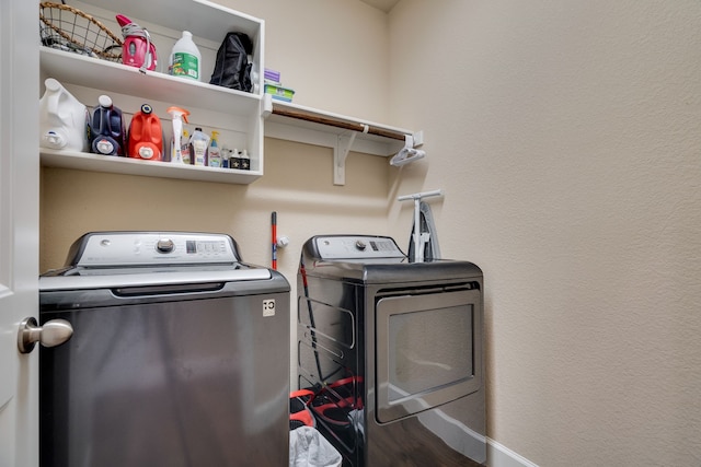 washroom featuring separate washer and dryer