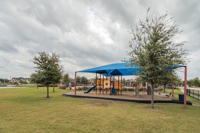 view of play area with a yard