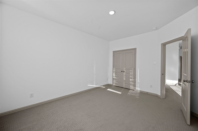 unfurnished bedroom featuring carpet floors