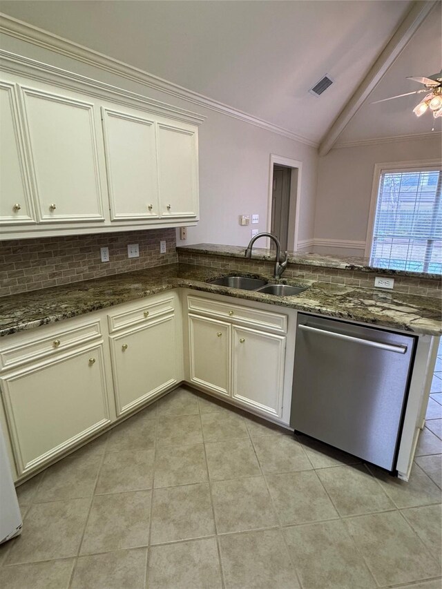 spare room featuring crown molding, carpet floors, and ceiling fan