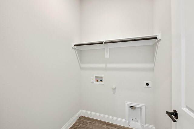 laundry room featuring hookup for an electric dryer, hookup for a gas dryer, and hookup for a washing machine