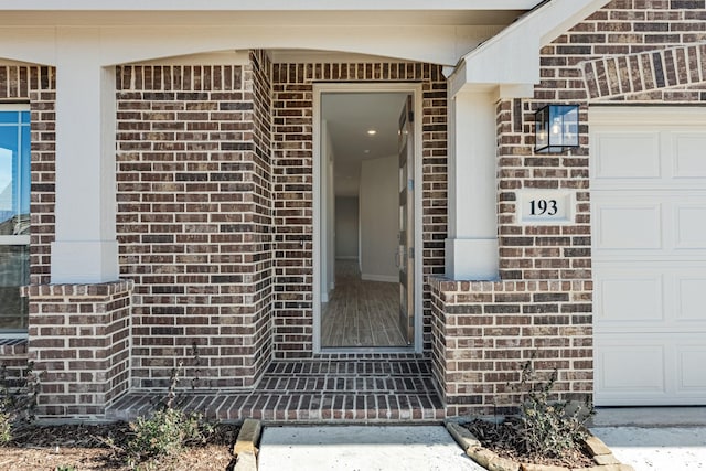 property entrance featuring a garage