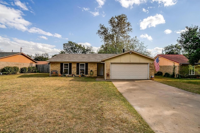 ranch-style house featuring a front lawn and a garage