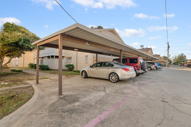 view of vehicle parking featuring a carport