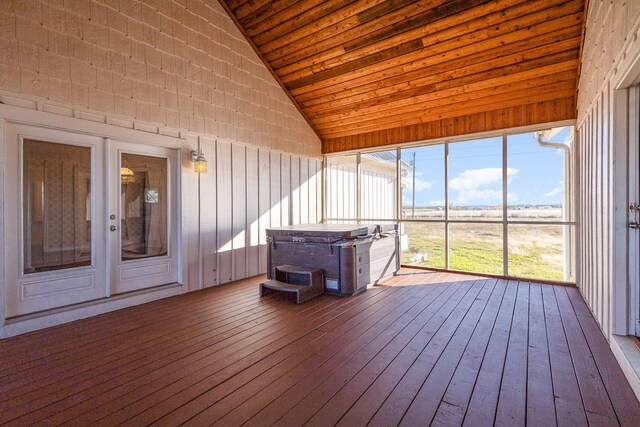 bathroom with wood-type flooring and lofted ceiling