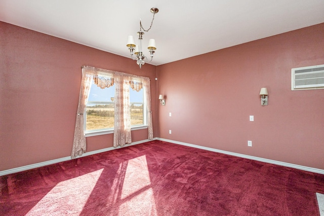 carpeted spare room with a wall mounted air conditioner and a notable chandelier