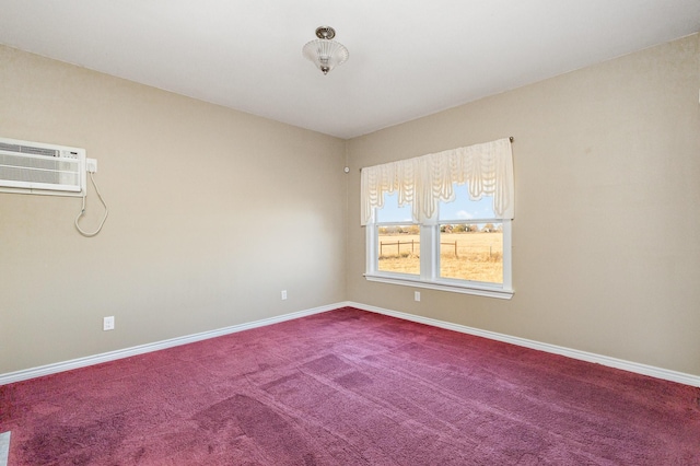 carpeted spare room with an AC wall unit