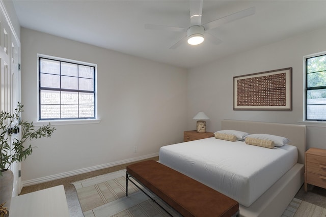 bedroom with carpet, a closet, and ceiling fan