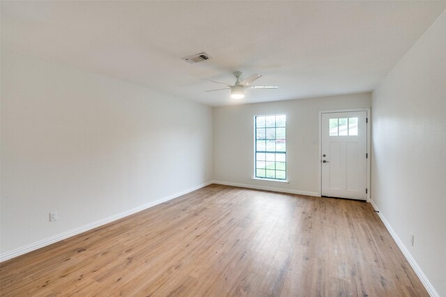 entryway featuring ceiling fan and light hardwood / wood-style floors