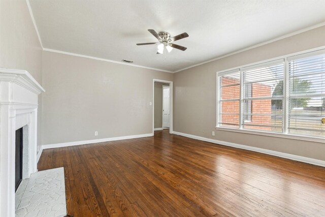 interior space featuring ornamental molding, ceiling fan, a textured ceiling, and dark hardwood / wood-style flooring