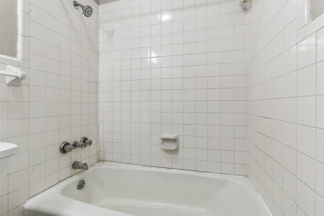 bathroom with vanity, hardwood / wood-style floors, and tile walls