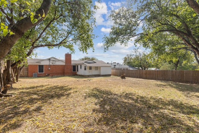view of yard featuring a fenced backyard