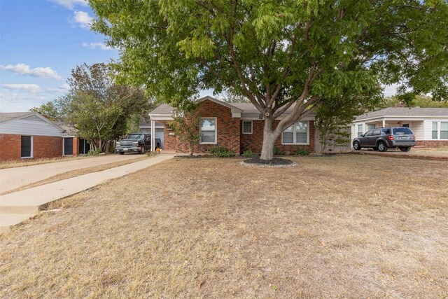 single story home featuring a garage