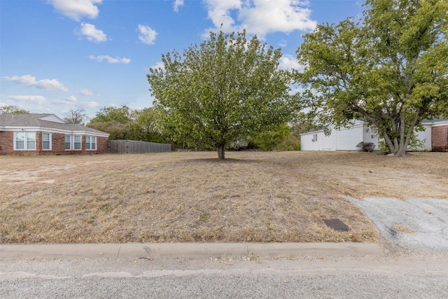 view of yard with fence