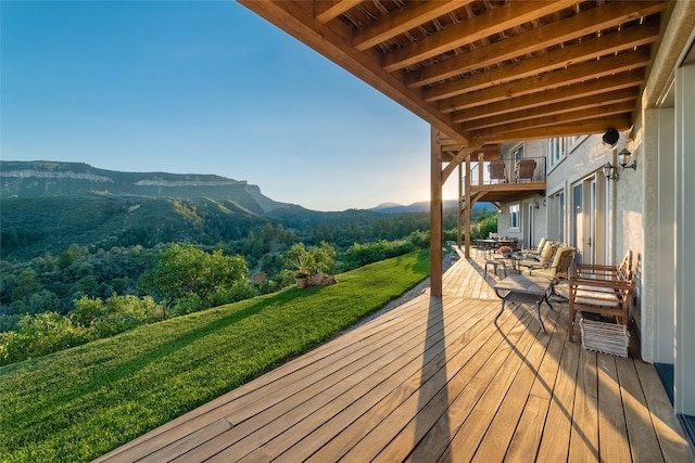 wooden terrace with a mountain view