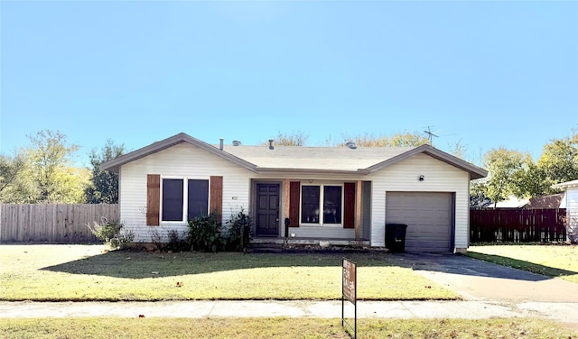 ranch-style house with a front lawn and a garage