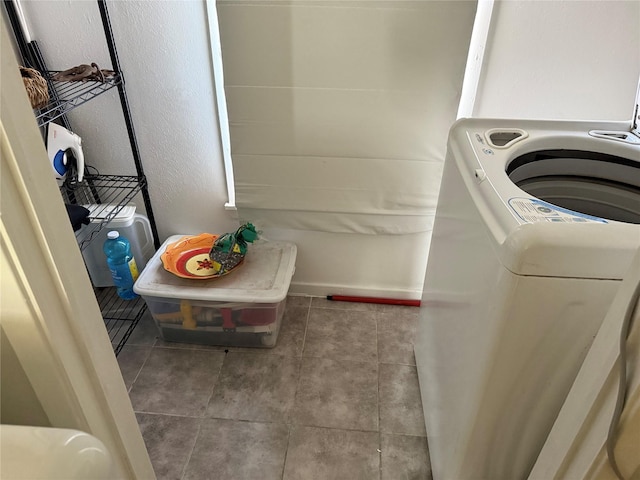 laundry room featuring washer / dryer