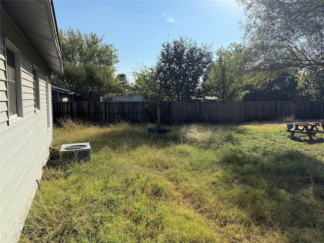 view of yard featuring central AC