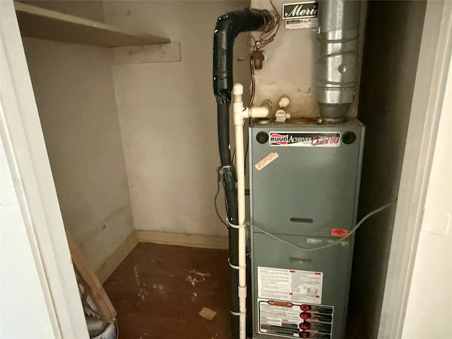 utility room with heating unit