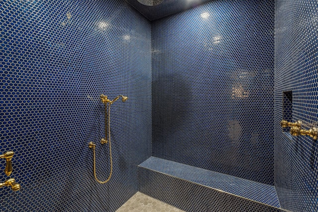 details featuring a tile shower