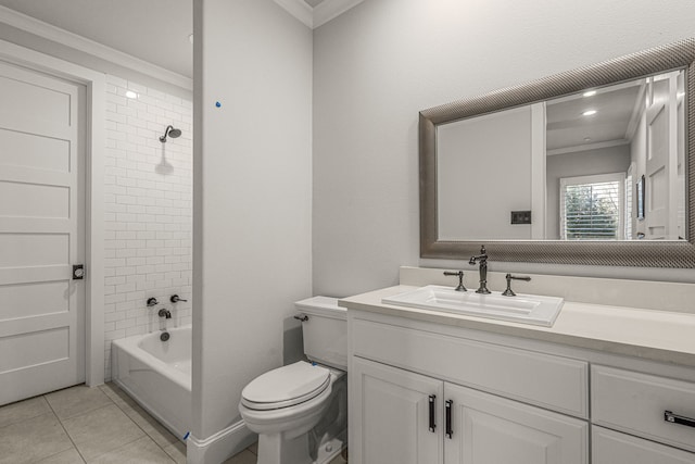 full bathroom with ornamental molding, toilet, vanity, tiled shower / bath combo, and tile patterned flooring