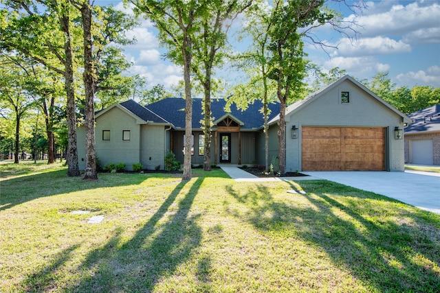 ranch-style home featuring a front yard and a garage